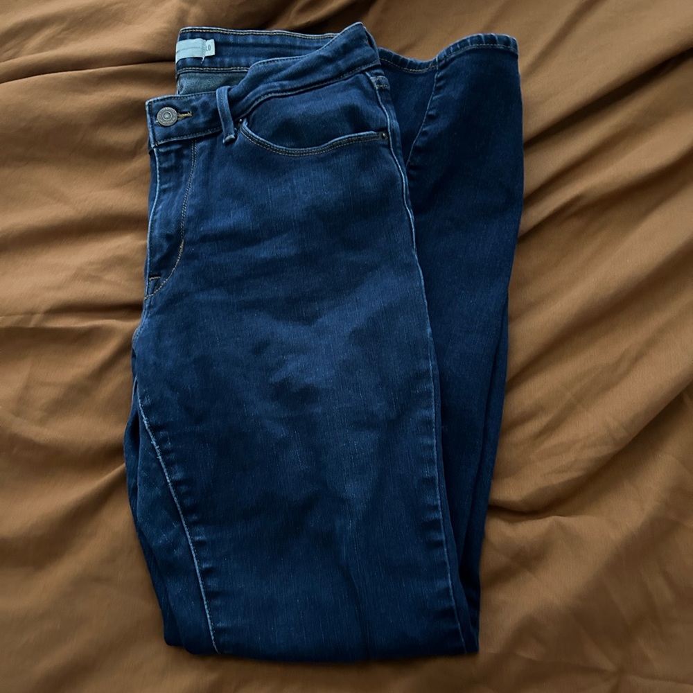 mid ride dark wash skinny jeans